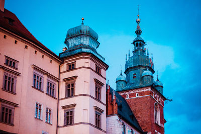 Low angle view of building against blue sky