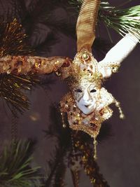 Close-up of dragon hanging on tree