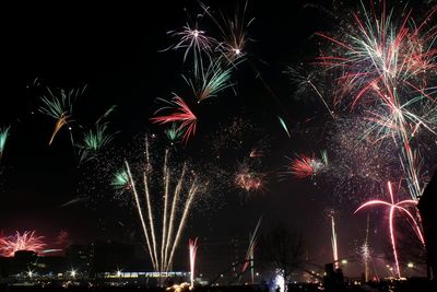 Low angle view of sky illumed with fire crackers