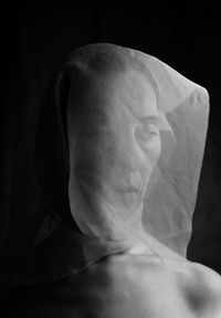 Woman with silk covering her head iii
