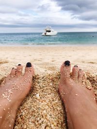 Low section of person on beach