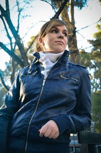 Portrait of young woman outdoors