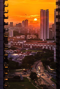 High angle view of buildings against sky during sunset