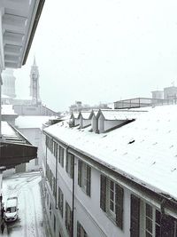 High angle view of buildings in city during winter