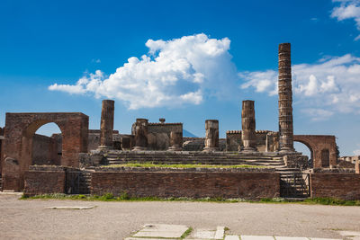 Temple of jupiter at the forum of the ancient city of pompeii in a beautiful early spring day