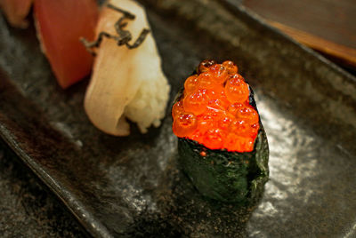 Close-up of sushi served on table