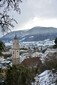 High angle view of buildings against sky during winter