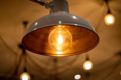 Close-up of illuminated light bulb