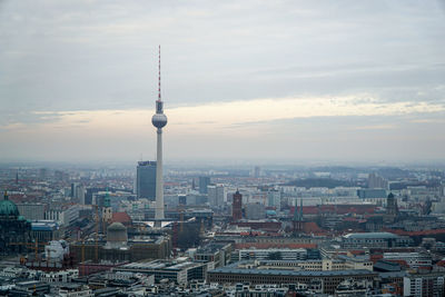 High angle view of communications tower in city