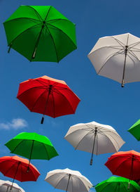 Low angle view of umbrella against sky