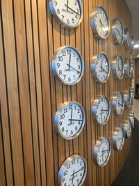 High angle view of clock on wood