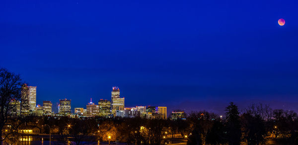 View of city lit up at night