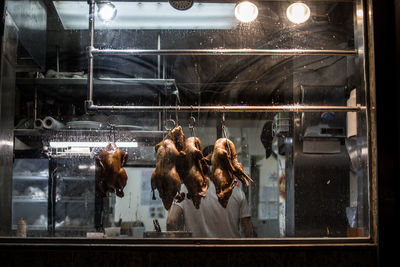 Group of people in glass window