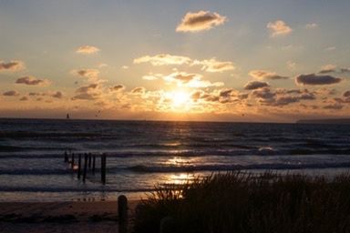 Scenic view of sea at sunset