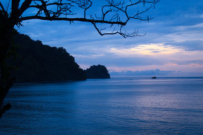 Scenic view of sea against sky at sunset