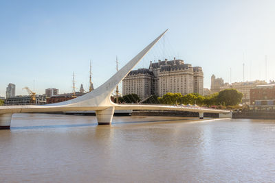 Bridge over river against clear sky