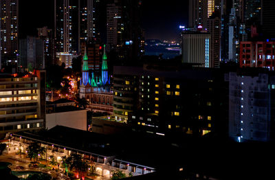 High angle view of illuminated buildings at night