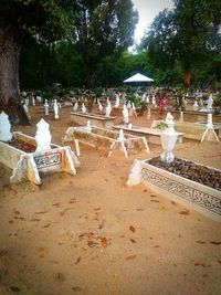 Statues on table in park