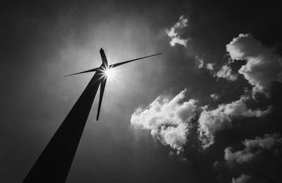 Low angle view of wind turbine against sky