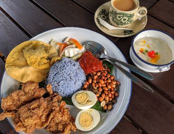 High angle view of breakfast served on table