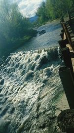 Scenic view of river against sky