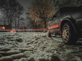 View of car on snow covered land