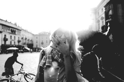 Young woman on street in city