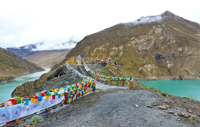 Scenic view of lake against mountain range on the tibetan plateau