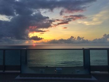 View of calm sea at sunset