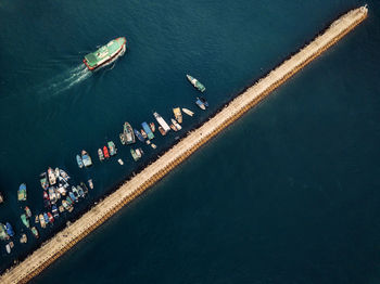 High angle view of people on boat in sea