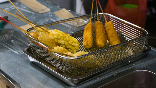 Fried korean corn dog with potatoes street food