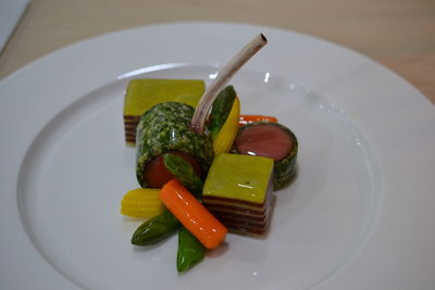 High angle view of vegetables in plate on table
