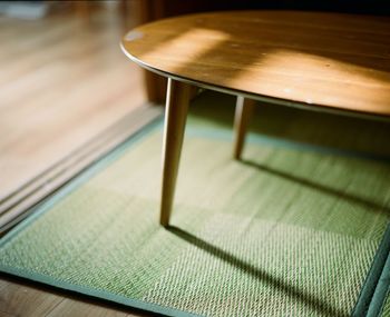 High angle view of table and chairs in cafe