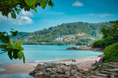 Scenic view of bay against sky