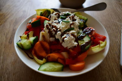 Close-up of salad served in plate on table