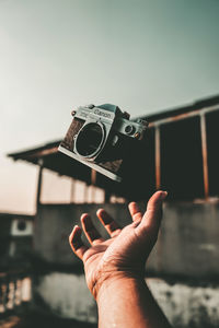 Low section of person photographing camera