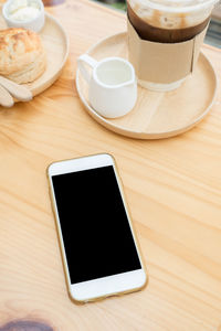 High angle view of coffee cup on table