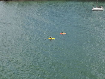 High angle view of people in sea
