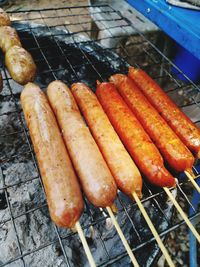 High angle view of meat on barbecue grill