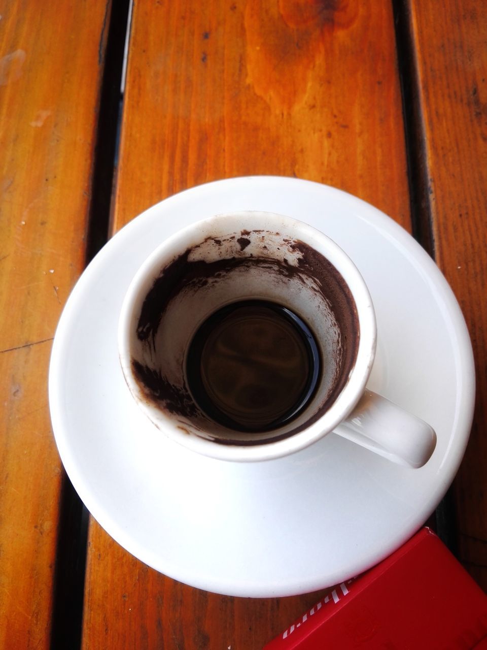 table, food and drink, drink, coffee cup, refreshment, wood - material, coffee - drink, no people, indoors, high angle view, saucer, close-up, directly above, freshness, day