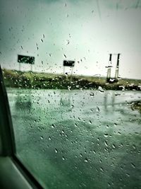 Close-up of raindrops on glass window