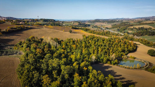 High angle view of trees on landscape against sky