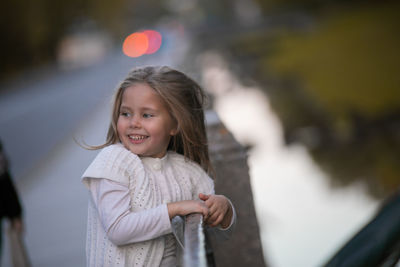 Beautiful little child girl walking in a park