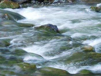 Waves splashing on rocks