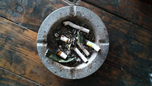 High angle view of cigarette on table