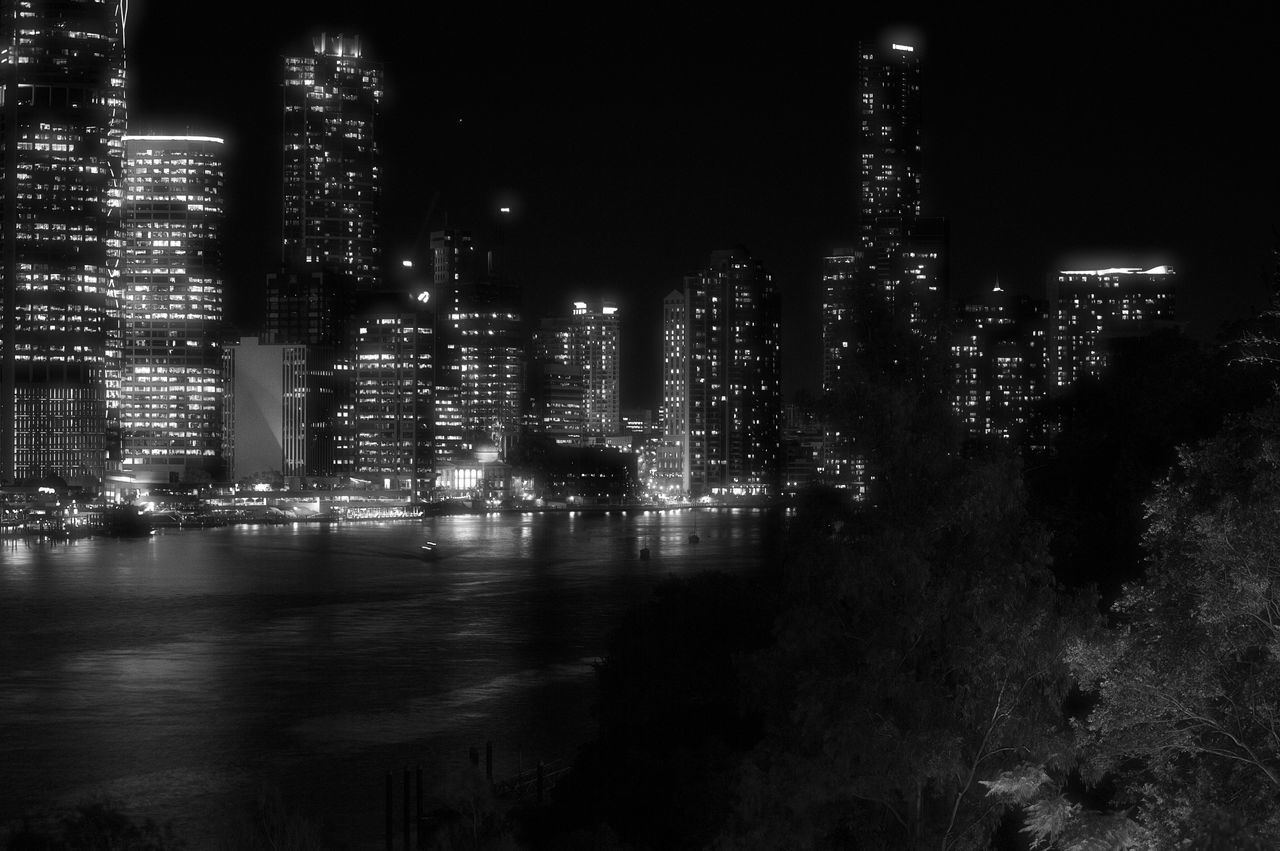 ILLUMINATED CITYSCAPE AT NIGHT