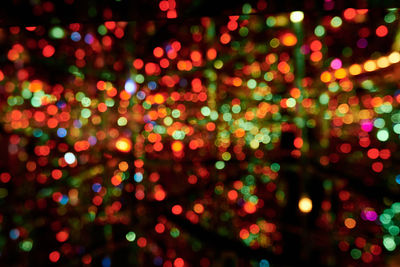 Defocused image of illuminated lights at night