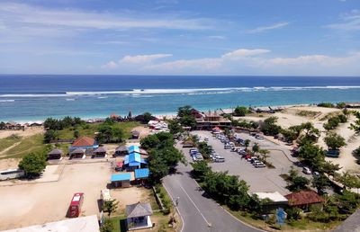 High angle view of road by sea against sky