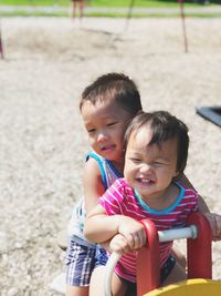 Cute boys playing at playground