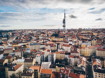 Aerial view of cityscape against sky